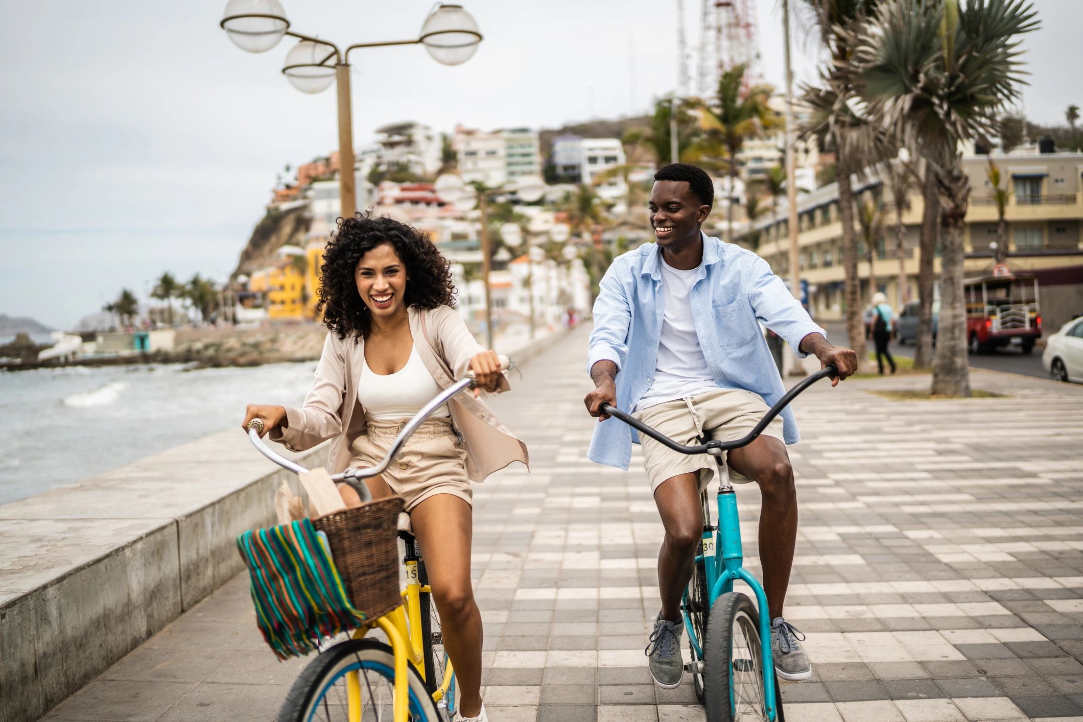 E-bike riders enjoying a scenic seaside route