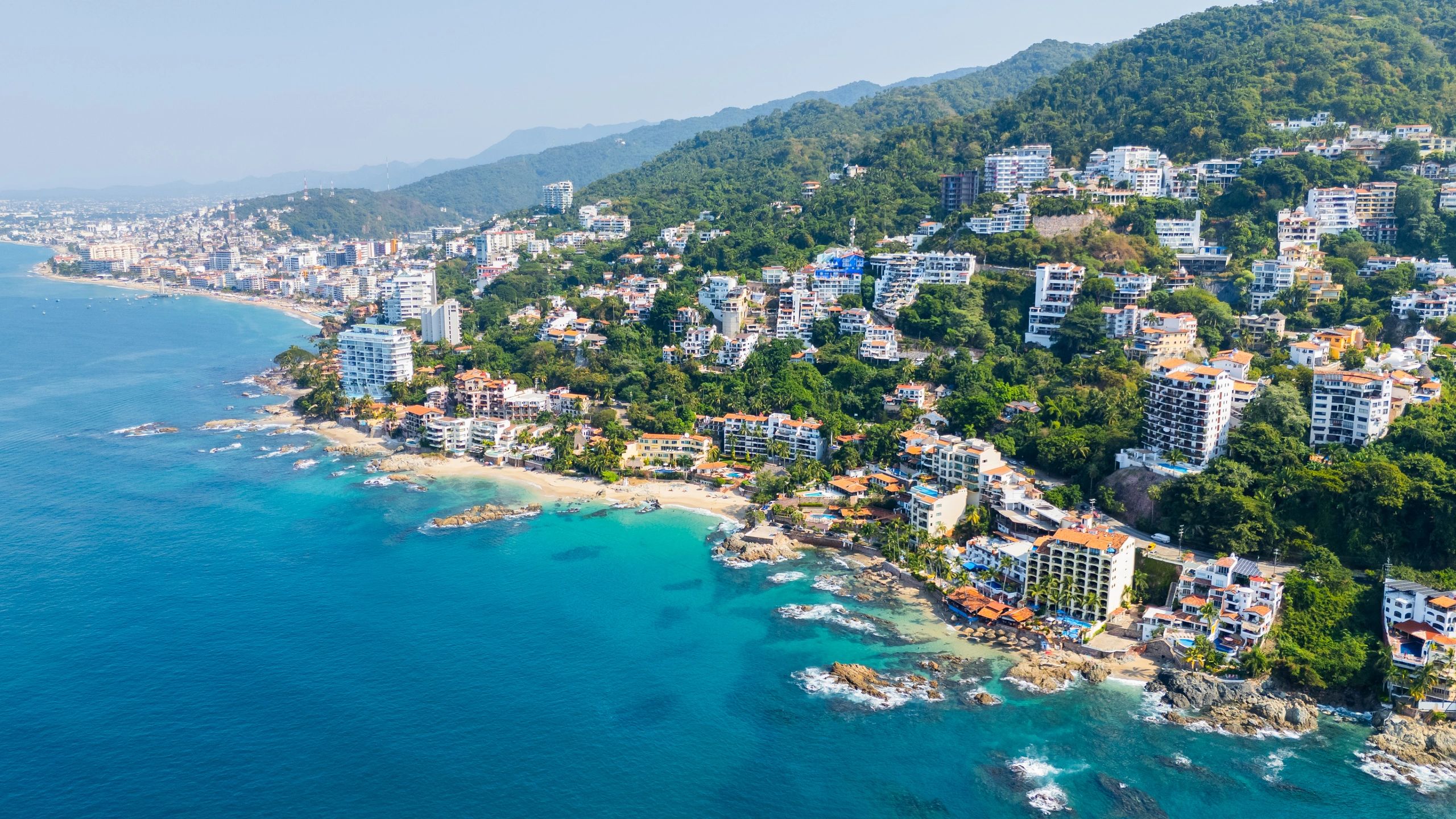 Puerto Vallarta coastline with green hills
